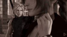 a man and a woman standing next to each other in a video game .