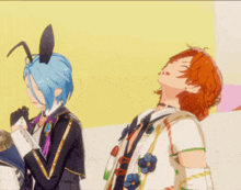 a boy with bunny ears is standing next to a boy with red hair