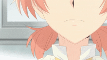 a close up of a girl with red hair