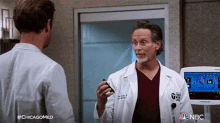 Flipping The Phone Dr Dean Archer GIF - Flipping The Phone Dr Dean Archer Chicago Med GIFs