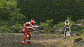 a man in a red and white costume holds a sword