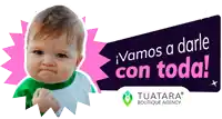 a baby with a fist in the air next to a banner that says vamos a darle con toda