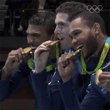 Winners Olympics GIF - Winners Olympics Biting On Gold GIFs