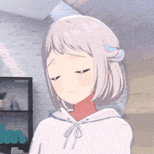 a girl with short white hair is wearing a white sweatshirt