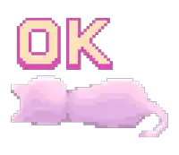 it looks like a pixel art of a cat laying down and the word ok .