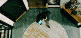 a man is standing on a round rug in a living room .