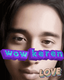 a close up of a man 's face with the words wow keren and love behind it