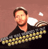 a man with a beard is standing in front of a sign that says " even he was weirded tf out " .