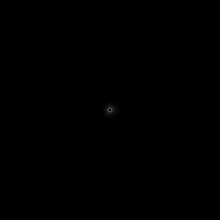 a black hole in the middle of a white circle on a black background .