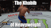 a man in a ufc ring with the words the khabib of heavyweight