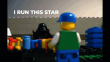 a lego man standing in front of darth vader with the words i run this star behind him