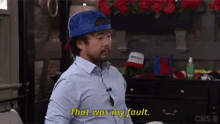 a man wearing a blue hat and a blue shirt says that was my fault .