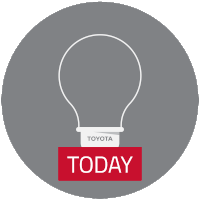 a gray circle with a light bulb with the word toyota on it