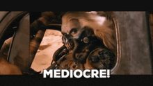 a man in a gas mask says mediocre in a movie