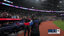 a baseball player with the number 4 on the back of his shirt