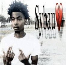 a black and white photo of a young man with sybau written on it