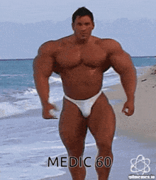 a muscular man in a bathing suit is walking on a beach with the words medic 60 below him