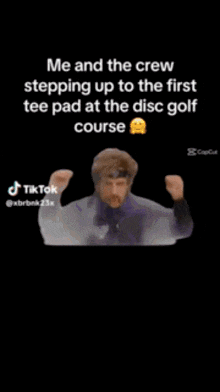 a tiktok video of a man stepping up to the first tee pad at a disc golf course