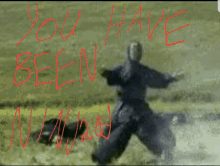 a picture of a scarecrow with the words " you have been killed " written in red