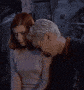 a man and a woman are standing next to each other and the man is saying " there there "