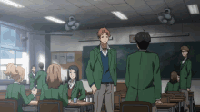 a group of people standing in a classroom with a blackboard