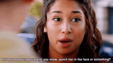 a woman with a surprised look on her face says did her boobs creep up and you know punch her in the face or something .