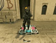 a soldier is standing on a dance mat with the letter b behind him