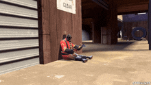 a video game character is sitting on the ground in front of a sign that says clear