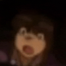 a blurry picture of a person with their mouth open .