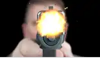 a man is pointing a gun with a bullet coming out of it