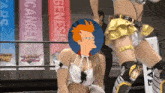 a woman in a wrestling ring with a sign that says genesis in the background