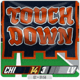 a banner that says " touch down " is on a football field