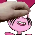 a person is putting their hand on a pink cartoon character 's head .