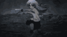 a person is standing in the dark with a glowing light coming out of their head .