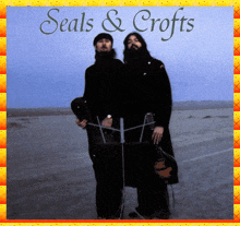 a seals and crofts album cover with two men standing in the desert