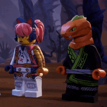 two lego figures standing next to each other with one wearing headphones and the other a snake