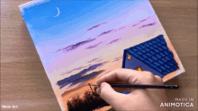 a person is painting a house with a brush on a canvas made by wow art