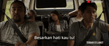 a group of people sitting in a car with the words besarkan hati kau tu on the bottom