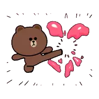 a brown bear is kicking a red heart