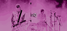 a man playing a guitar and a man playing drums with the letter y on the bottom right