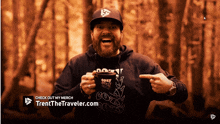 a man with a beard is holding a cup of cozy coffee