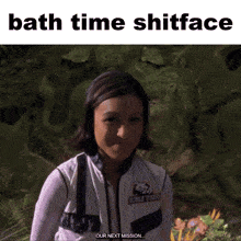 a picture of a girl with the words bath time shitface on top