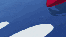 a cartoon drawing of a red and white object with a blue background