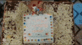 a birthday cake with the word happy on it