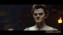 a man 's face is shown in a clip with the word understood below it