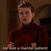 a woman in a red turtleneck sweater is talking about a mental patient