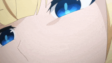 a close up of a person 's eyes with blue and white