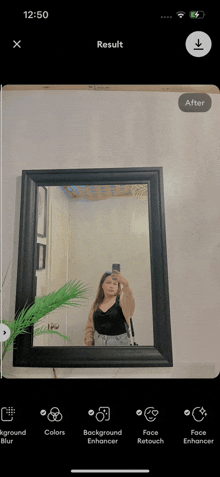 a woman is taking a selfie in front of a mirror with the time of 12:50