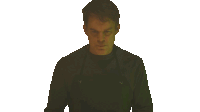 a man in a black shirt is looking at the camera with a white background