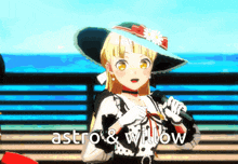 a girl in a hat is holding a microphone and the words astro & willow are behind her